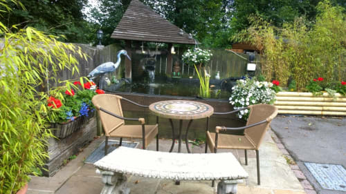 The fish pond and seating area