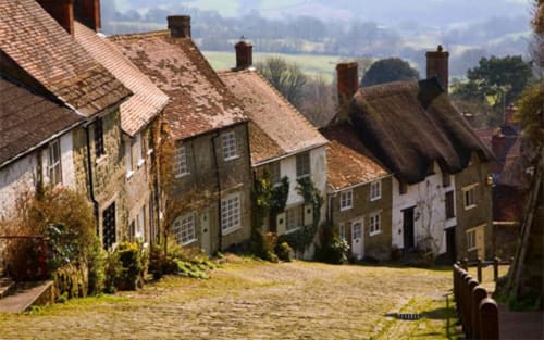 Golden Hill cottages, Three Little Pigs hotel in Blandford Forum, Dorset with thatched roofs