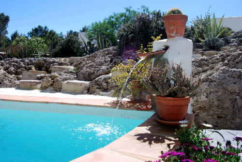 private swimming pool with water feature