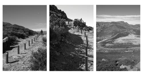 Vistas de paisagem montanhosa perto de Cota 1500 em Penhas da Saúde, Portugal com caminhos sinuosos e vales florestados