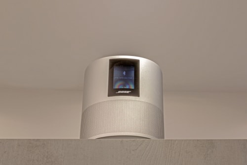 Bose smart speaker with display on wooden shelf at Casa Mirko B&B in Arezzo