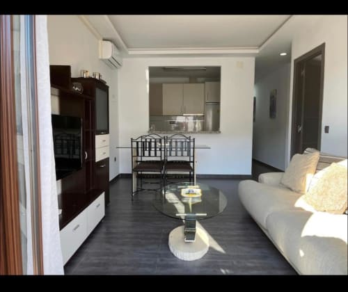 Salón comedor comunicado con cocina