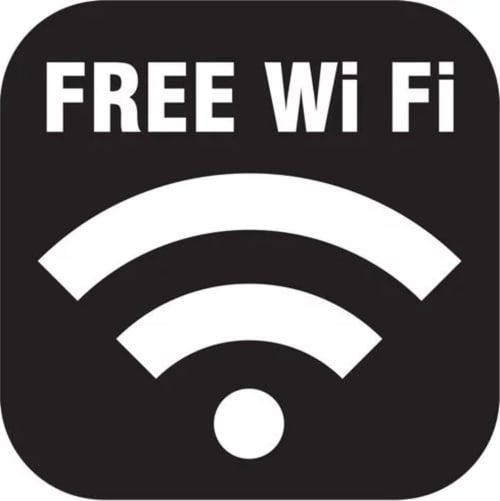 Free WiFi symbol with signal waves on dark background for Chambres d'hôtes La ferme de l'Ostrevent in Estrées