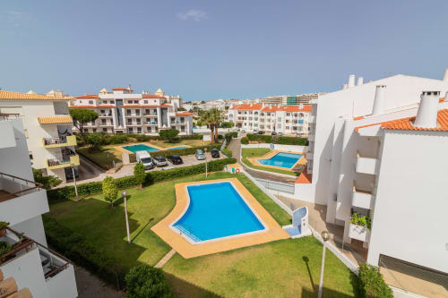 aerial view of the apartment and the swimming pool | Sand & Sea Apartment – Modern Living with Ocean Views