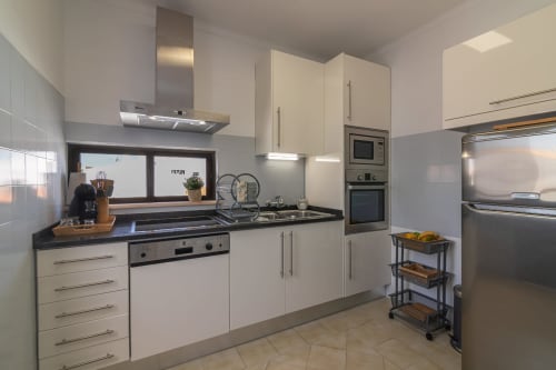 fully equipped kitchen | Sand & Sea Apartment – Modern Living with Ocean Views