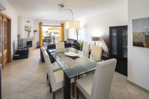 big dining table and living area | Apartment Rosal CM – Stylish Apartment Close to Albufeira’s Attractions