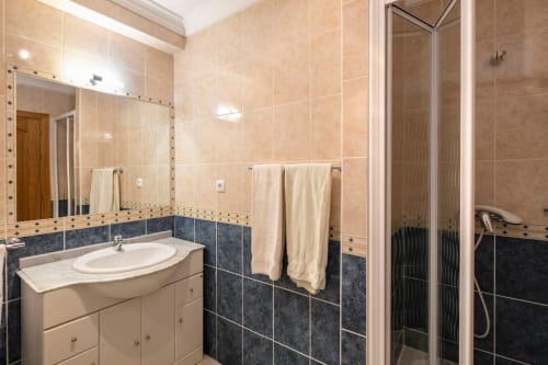 bathroom with shower area | Rosal CN Apartment – Family-Friendly Comfort in Albufeira