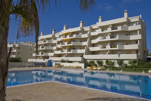 outdoor swimming pool and the apartment | Rosal CN Apartment – Family-Friendly Comfort in Albufeira