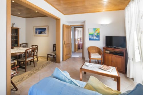 dining and living area | Casa da Vila Apartment – Traditional Charm in Albufeira Old Town