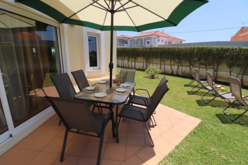 outdoor dining area and bench | Villa Pacheco @ Encosta da Balaia – Premium Holiday Villa in Albufeira