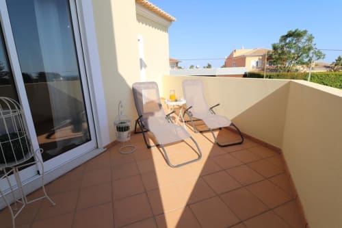 balcony with bench | Villa Pacheco @ Encosta da Balaia – Premium Holiday Villa in Albufeira