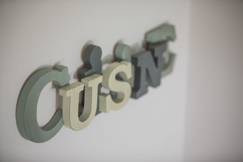 3D text spelling 'custom' at Verdolivo bed and breakfast in Sale Marasino, Italy