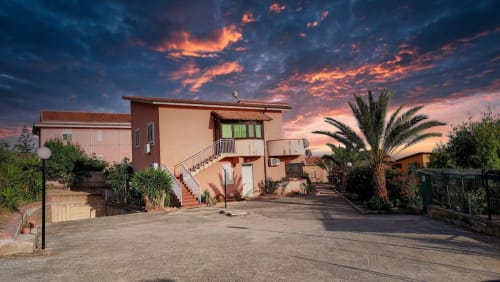 Appartamento Stella Marina a Porto Empedocle, costa di Agrigento, con architettura moderna, palme e tramonto spettacolare