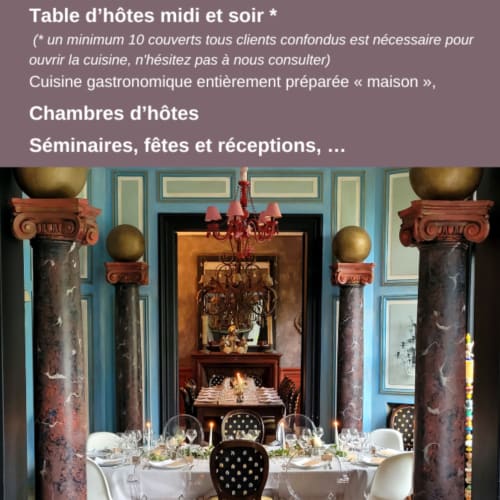 Elegant dining room at Le Grand Duc, Valenciennes with marble columns and fireplace
