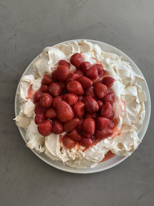Homemade cream cake topped with fresh raspberries at Maison Mûrier, a charming bed and breakfast in Fayssac, France