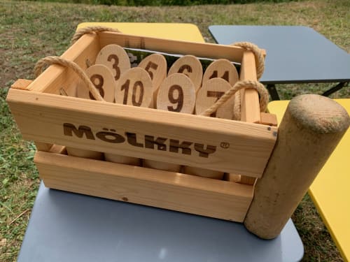 Mölkky wooden game set at Le Paradis de Lucile, La Roche Guyon B&B with numbered pins and tossing puck
