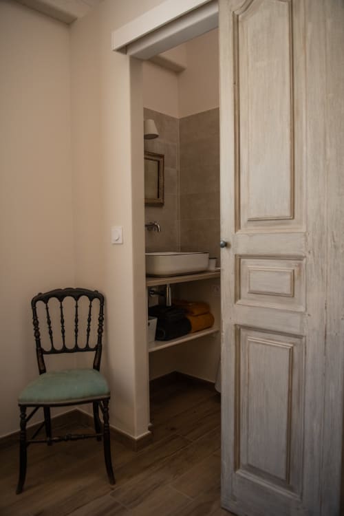 Refined bathroom with authentic style at Bastide Toujours Dimanche, Gordes, Luberon, Provence, France.