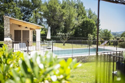 Private pool, lush garden, and peaceful landscapes at Bastide Toujours Dimanche, Gordes, Luberon, Provence, France.