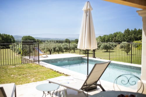Heated private pool, olive grove, panoramic view of the Luberon, and peaceful atmosphere, Bastide Toujours Dimanche, Gordes, Provence, France.