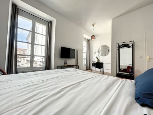 Appartement Le Seventies au Laurencin, appart’hôtel à Sens centre-ville. Cuisine équipée, wifi, linge, arrivée autonome. Réservez en direct.