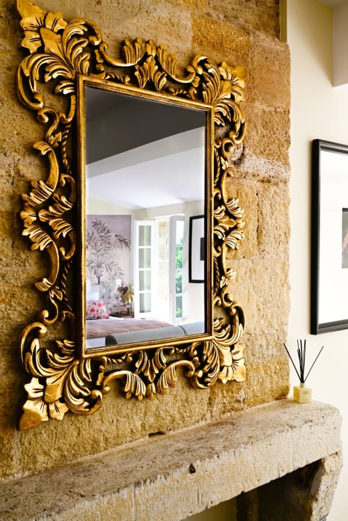 Ornate gold baroque mirror in Studio Deluxe Cabernet at Pavillon Des Millesimes, Lussac
