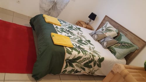 Chambre de villa à Case Vi D'O à La Plaine des Cafres avec literie botanique et vue sur les montagnes