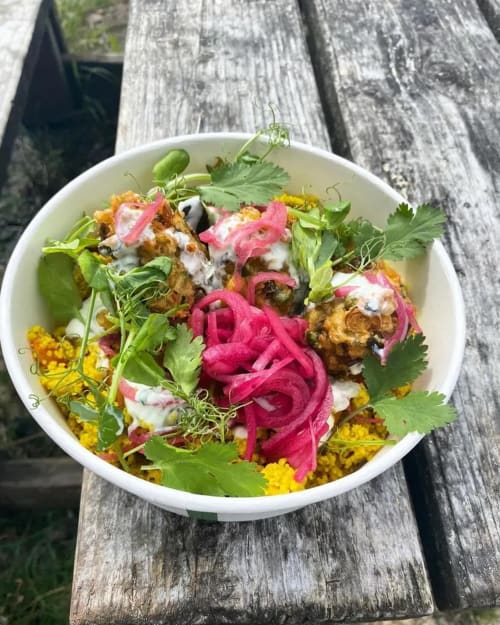 Colorful gourmet dish at Seabrook Lodge in Clifden, Galway featuring crispy elements, pickled beets, fresh herbs, and creamy