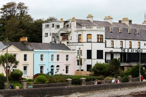 Colorful beachfront buildings at Eglinton Road Bray, a seaside B&B in Ireland with historic architecture and ocean views.