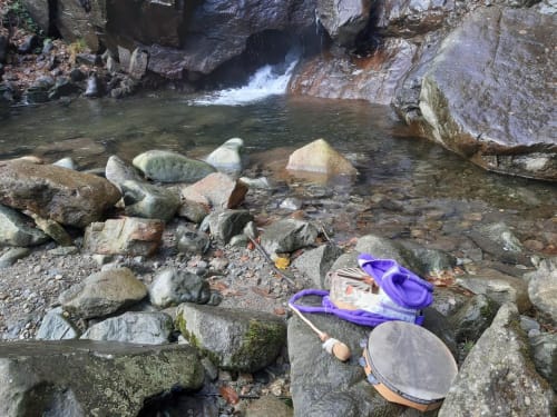 Mountain stream with rocky banks and snorkeling gear at CasaRosada, Vidracco Italy
