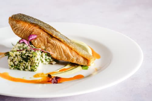 Pan-seared salmon fillet with herb risotto and orange sauce at Sliabh Beagh Hotel, Monaghan