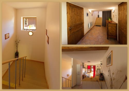 Couloirs et espaces communs du Gîte La Grange à Neuf-Brisach avec portes en bois, escaliers et équipements modernes