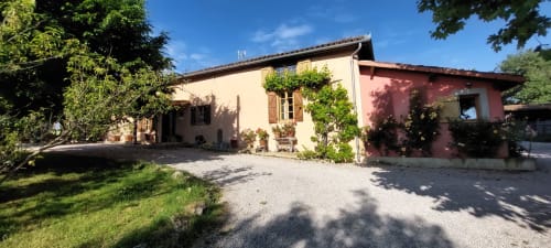 Les Gites de Campardon countryside B&B in Monties, France with charming stone facade and lush gardens