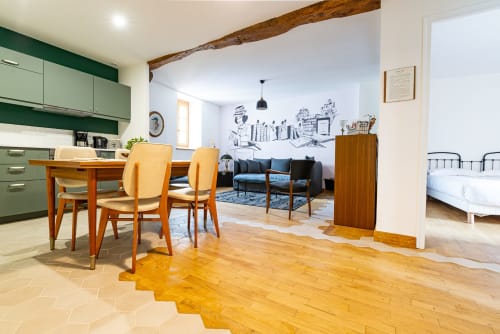 Logis George apartment at La Maison George, Flavigny sur Ozerain - open-plan living with dining table, kitchen, sofa and
