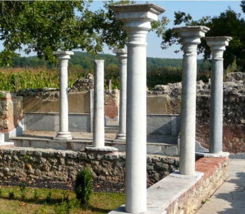 Ancient Roman columns at Les Gites de Campardon archaeological site in Monties, France