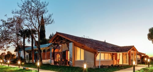 Les Gites de Campardon BnB in Monties, France - modern cottage with warm lighting at dusk