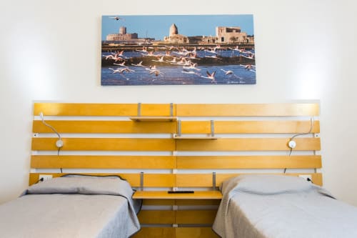 Twin beds with yellow headboard overlooking coastal Sicily view at Villa Maria, Sant'Andrea