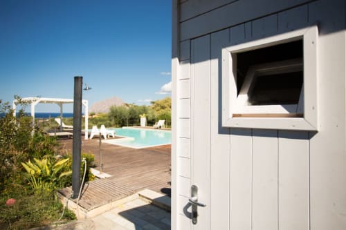 White villa entrance with pool, sea view and mountain landscape at Villa Maria, Sant'Andrea Valderice
