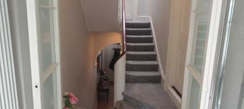 Hallway with staircase at Eglinton Road Bray B&B in Bray, Ireland