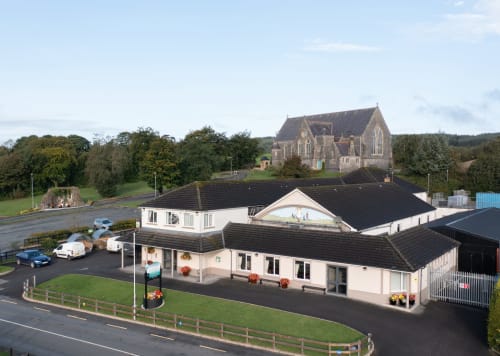 Sliabh Beagh Hotel & Tourism Centre in Monaghan with church and grounds