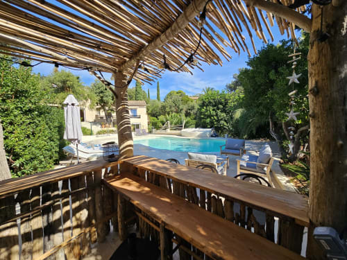 Villa Sigahi's Sigahi House pool view terrace with shaded pergola overlooking turquoise pool, La Croix Valmer