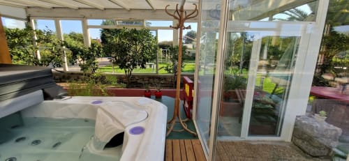 domaine-de-millox_spa-dans-la-serre-avec-vue-sur-le-jardin