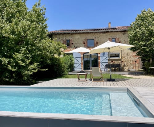 Swimming pool and terrace at Maison Monsieur Léger vacation home in Montaut, France