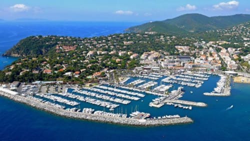 Aerial view of Marina Port Grimaud with hillside villas in La Croix Valmer, French Riviera