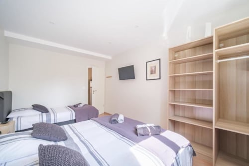 Chambre cosy du gîte Le Caveau de Sigo à Kaysersberg Vignoble, décor alsacien authentique