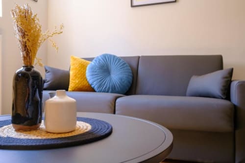 Chambre cosy du gîte Le Caveau de Sigo à Kaysersberg Vignoble, décor alsacien authentique