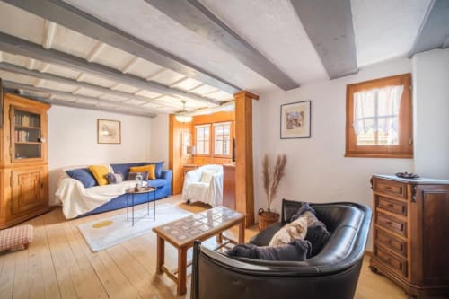 Séjour lumineux et spacieux du gîte L’Oriel du Rempart Nord