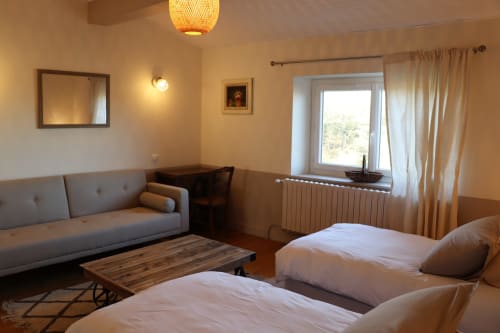 La grande chambre avec lits en 90 pouvant être rapprochés pour profiter d'un King Size dans la chambre d'hôtes chez Martine