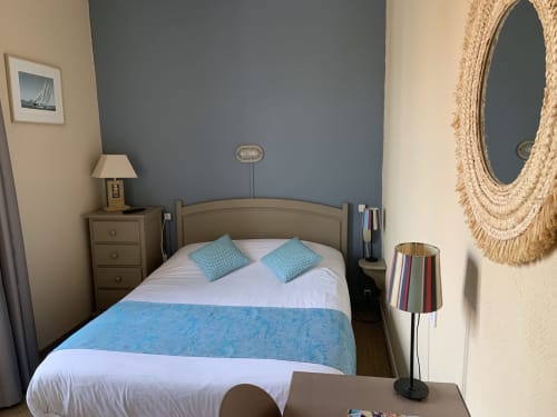 Cozy double bedroom at Hôtel Maison Richet, Les Sables-d'Olonne with blue accents and modern amenities