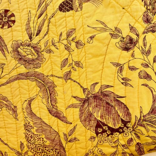 linge de lit jaune fleuri
