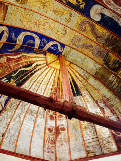 Ornate wooden ceiling with traditional French decorative patterns at Domaine de l'Ocrerie, Pourrain
